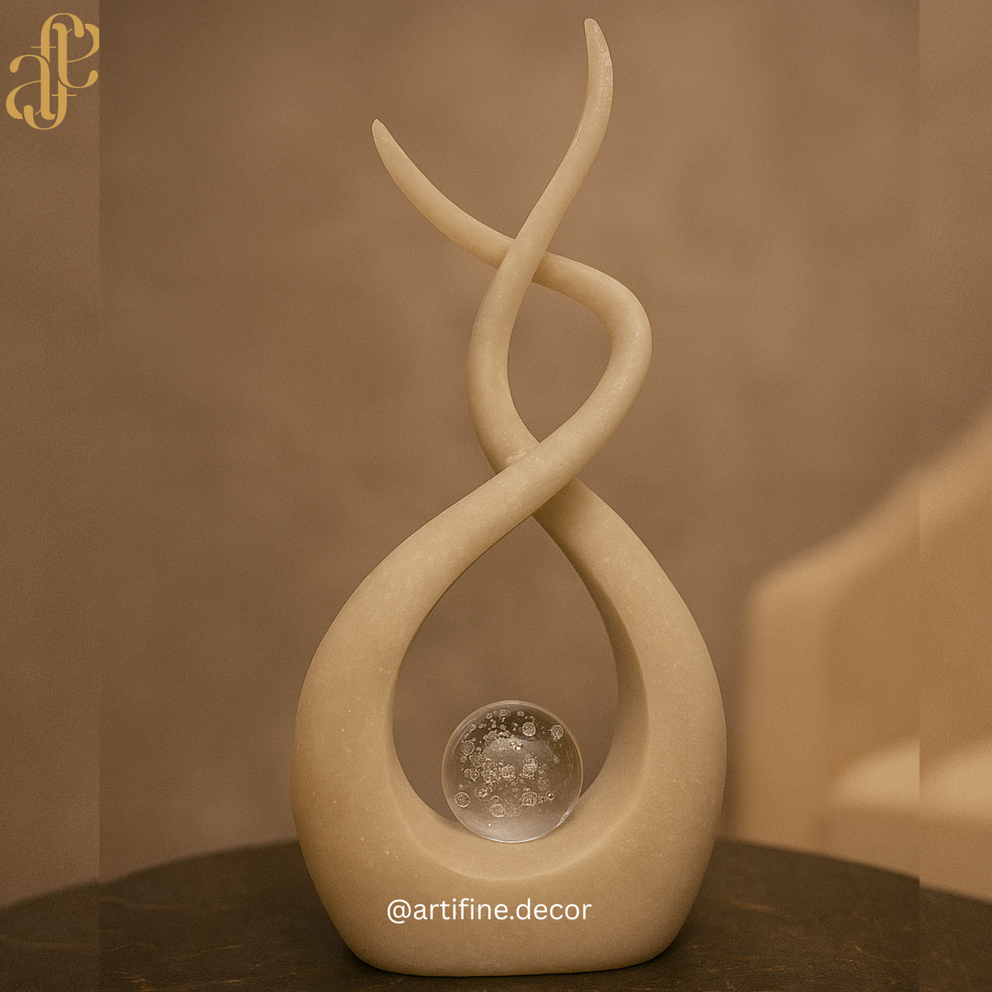 Elegant Infinity Sculpture with Crystal Sphere