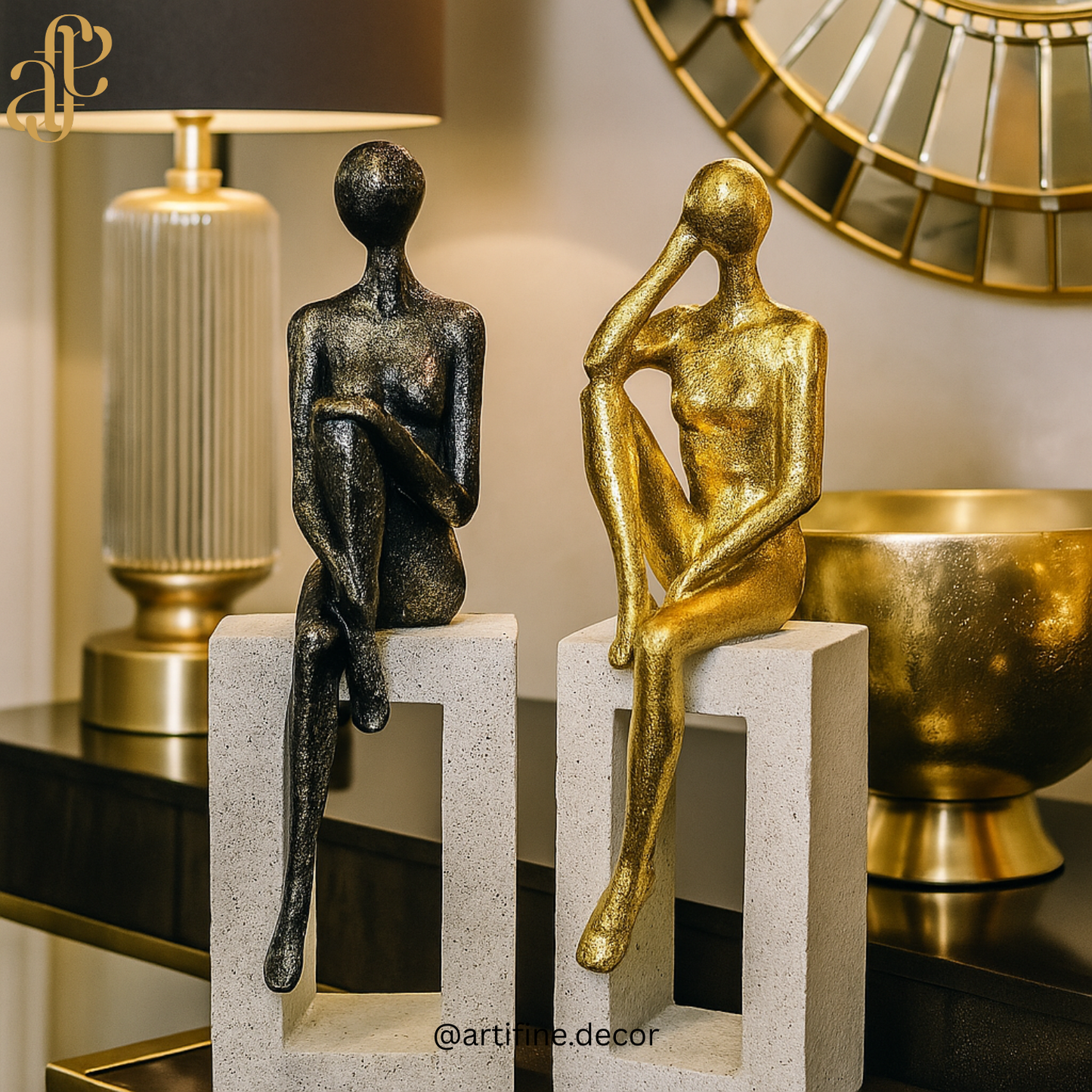 Elegant Sitting Figurines on Stone Blocks