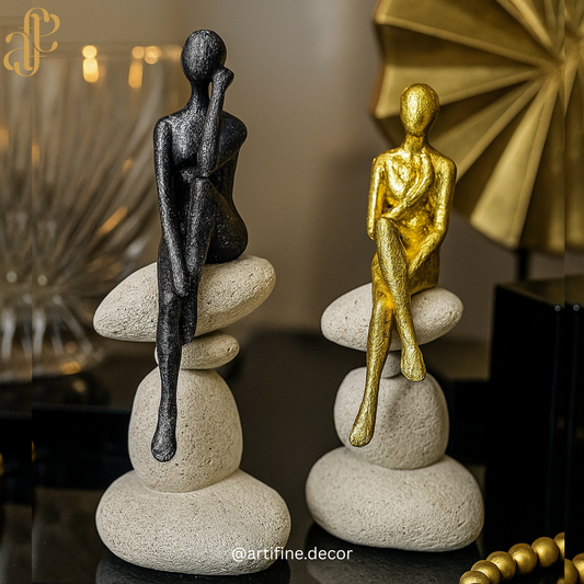 Elegant Sitting Figurines on Stone Pebble Base
