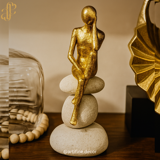 Elegant Sitting Figurines on Stone Pebble Base